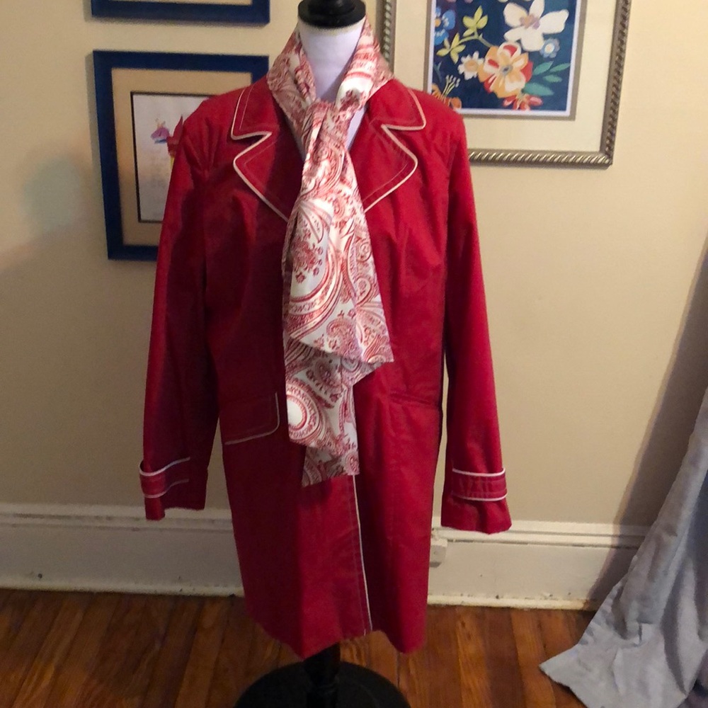 Slightly used raincoat with scarf
